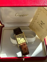 face — Cartier Tank Must