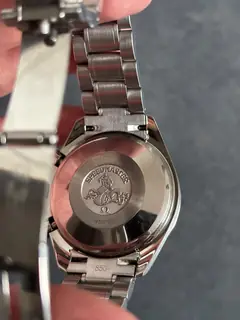 fond — Omega Speedmaster